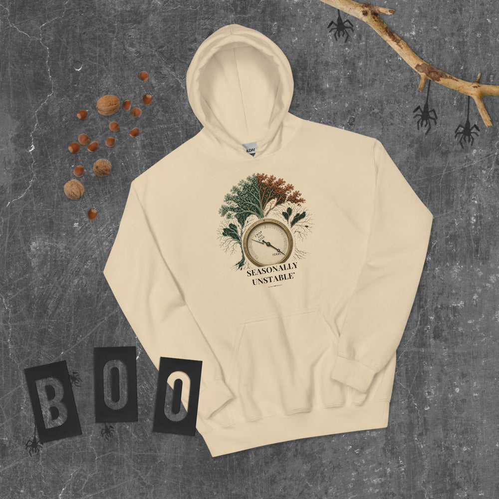 Seasonally Unstable Hoodie mockup — Soft Cream